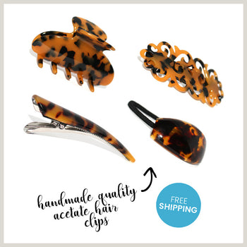 Black Hair Clip made from acetate and featuring a filigree pattern.